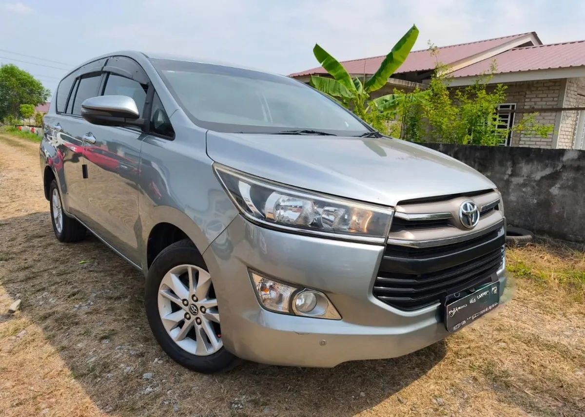 Silver Toyota Innova 7-seater rental car