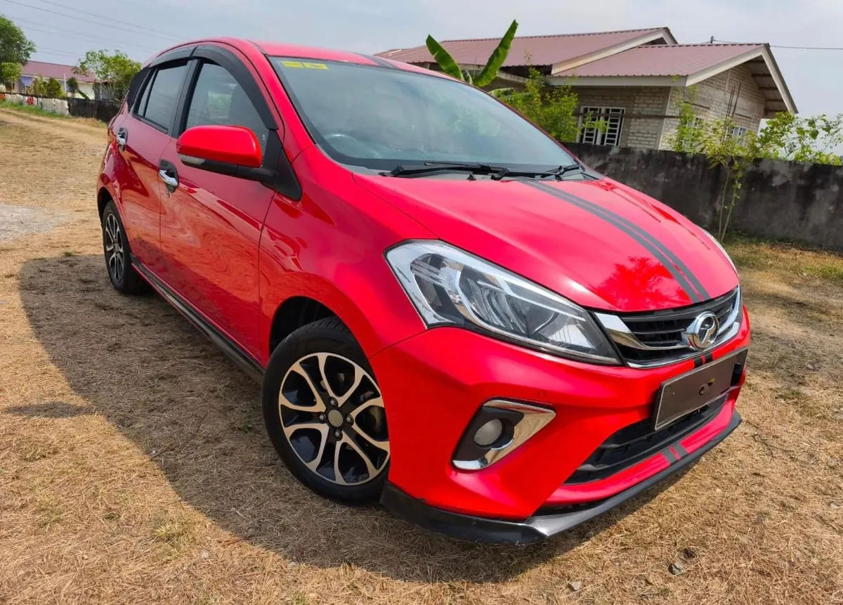 Red Perodua Myvi rental car